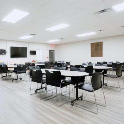 Large open area concept dining and kitchen area for families at the Salvation Army Women and Children's Center